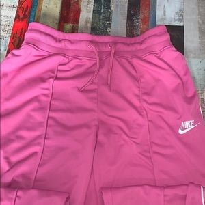 Nike track pants in a perfect pink